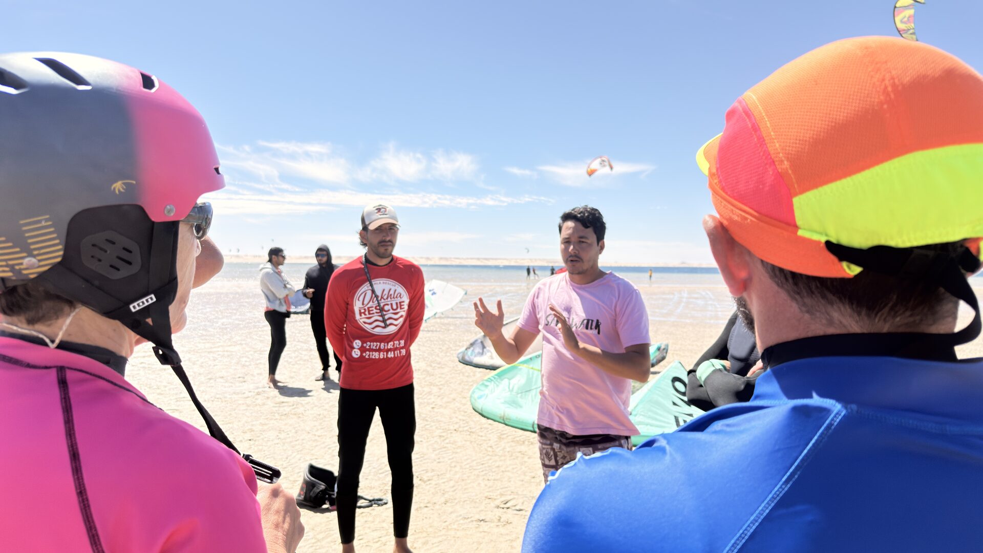 Surf group celebrating on Dakhla beach